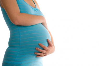Pregnant in blue tank top