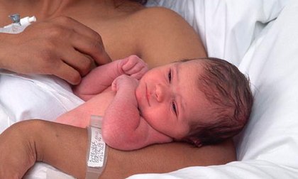 Woman holding infant