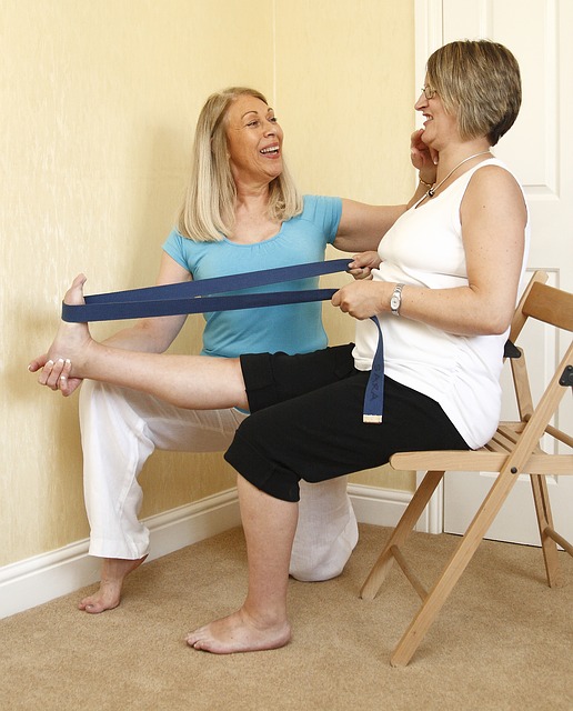 Woman and trainer stretching