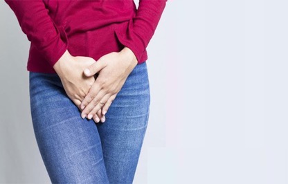 Woman holding bladder