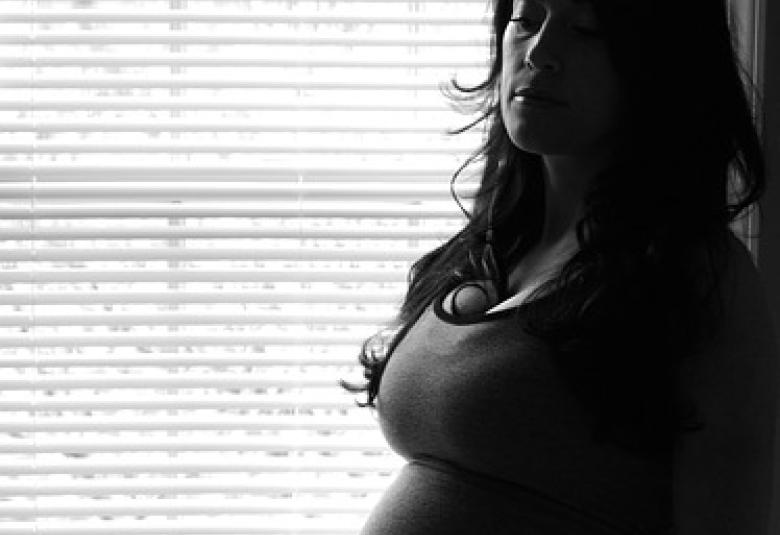 Pregnant woman in black and white.