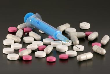 Syringe and Pills