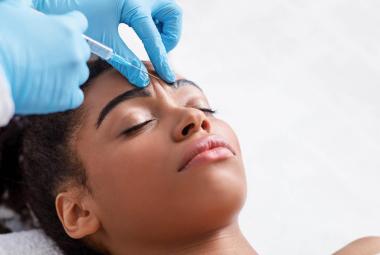Woman receiving botox treatment